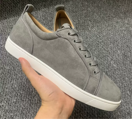 Grey red soled shoes